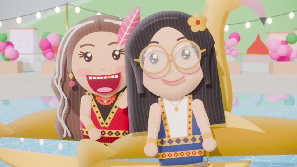 Two of our team as cartoon dolls on a golden swan float in a pool: NaN, who runs Hongdam, and our coordinator Beer.